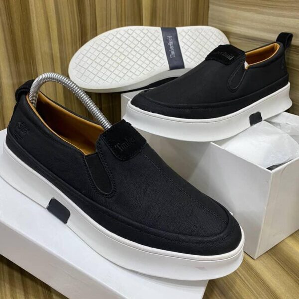 Timberland Men’s Black Slip-On Sneakers – White Platform Sole