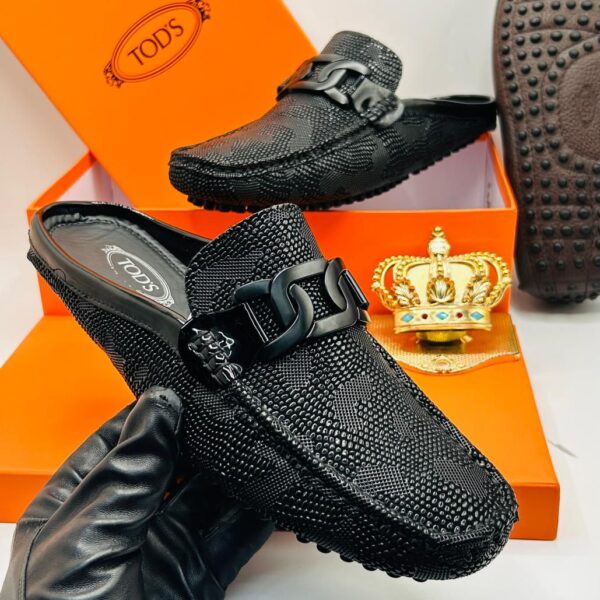 Tod's Black Textured Leather Loafers with Matte Black Buckle