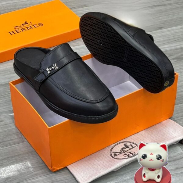 Hermès Likely Mules in Black Leather